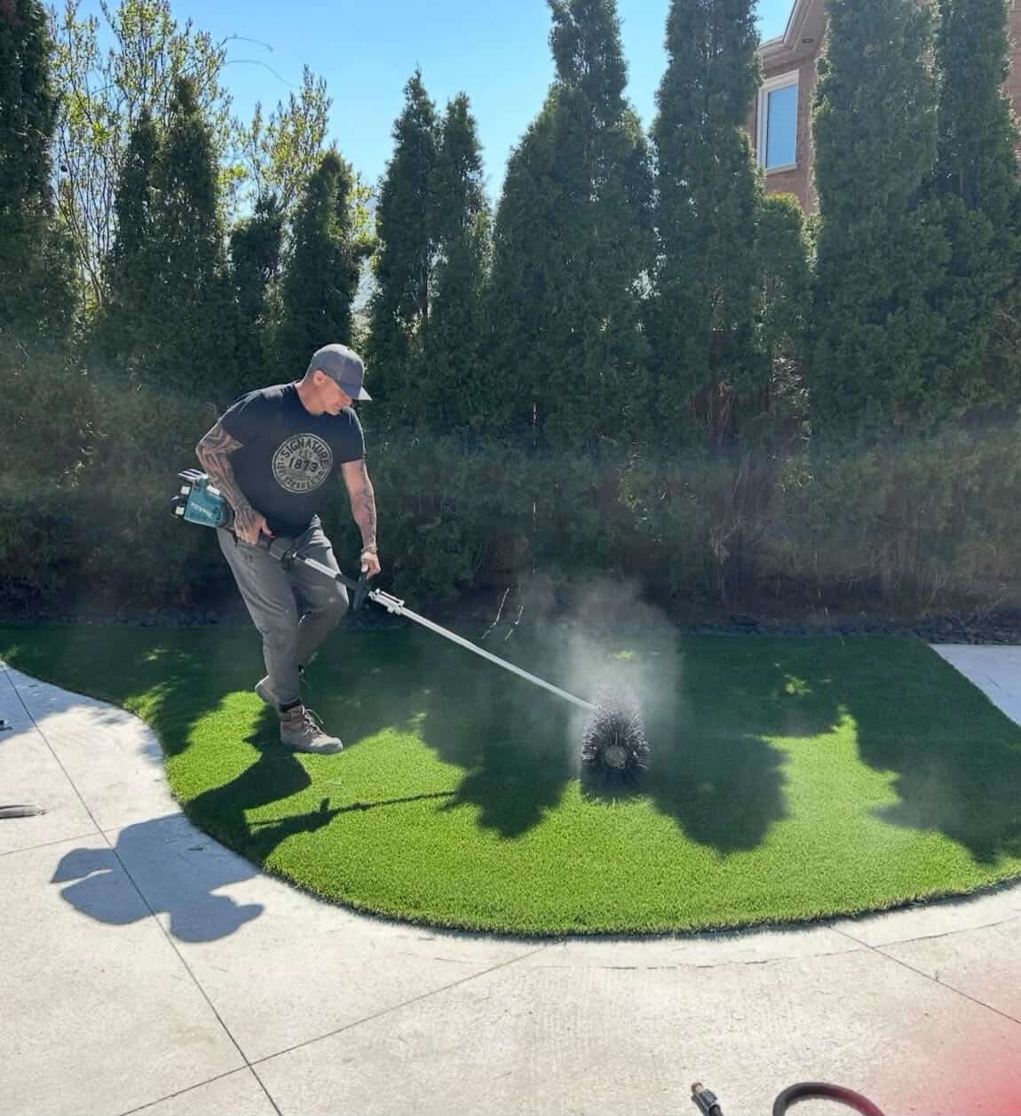 Rock Solid team working on a turf installation